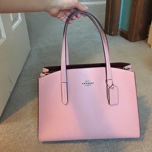 coach charlie carryall pink